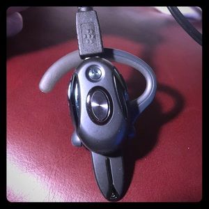 Motorola over the ear Bluetooth black ear piece.